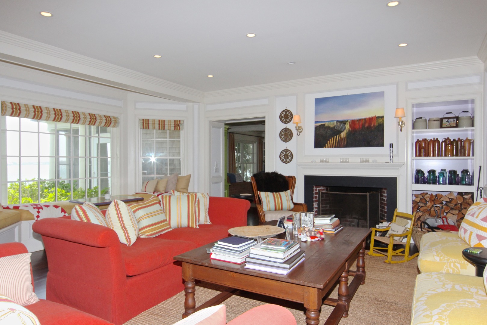 22 Lelands Path Edgartown, MA 02539 - Photo 22 of 87 a living room with furniture a fireplace and a large window