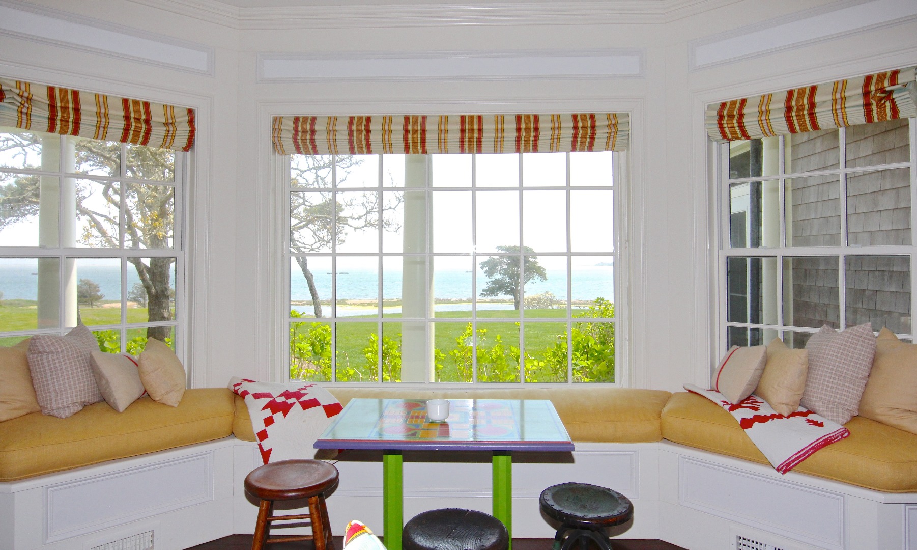 22 Lelands Path Edgartown, MA 02539 - Photo 24 of 87 a living room with furniture and floor to ceiling windows