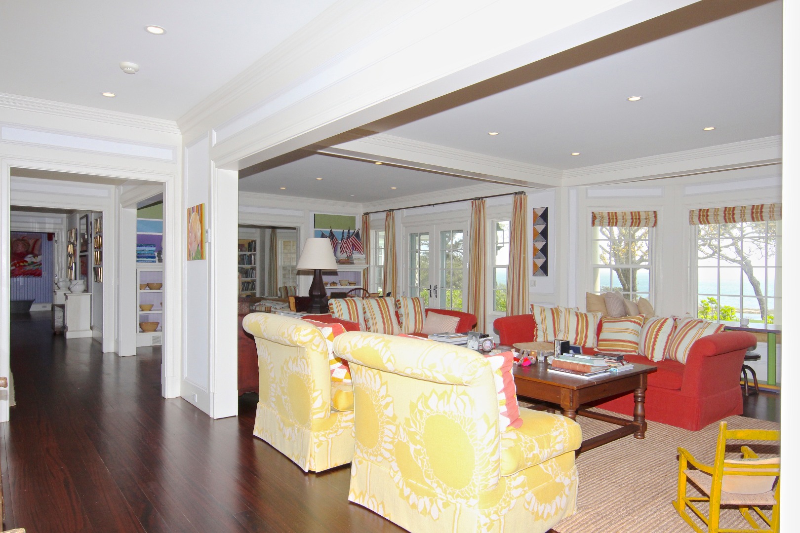 22 Lelands Path Edgartown, MA 02539 - Photo 26 of 87 a living room with furniture a wooden floor and a large window