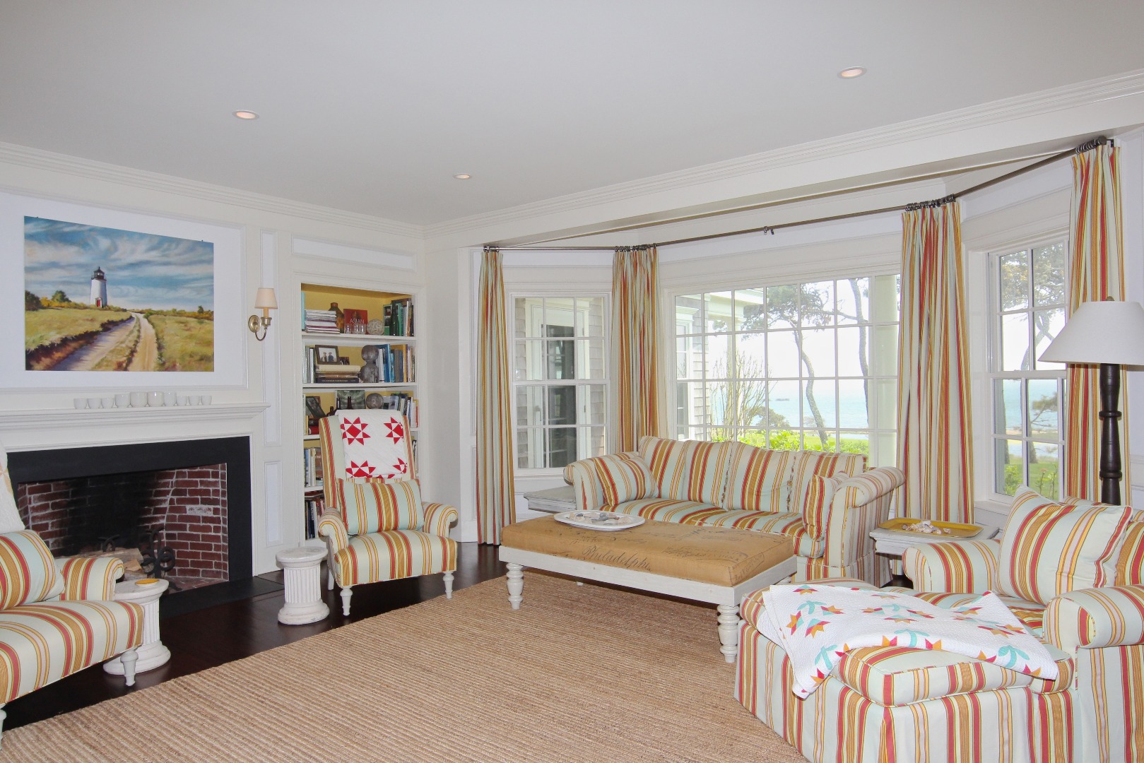 22 Lelands Path Edgartown, MA 02539 - Photo 27 of 87 a bedroom with furniture and a fireplace
