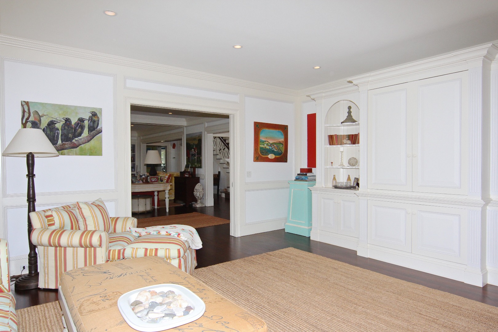 22 Lelands Path Edgartown, MA 02539 - Photo 28 of 87 a bedroom with furniture and a wooden floor