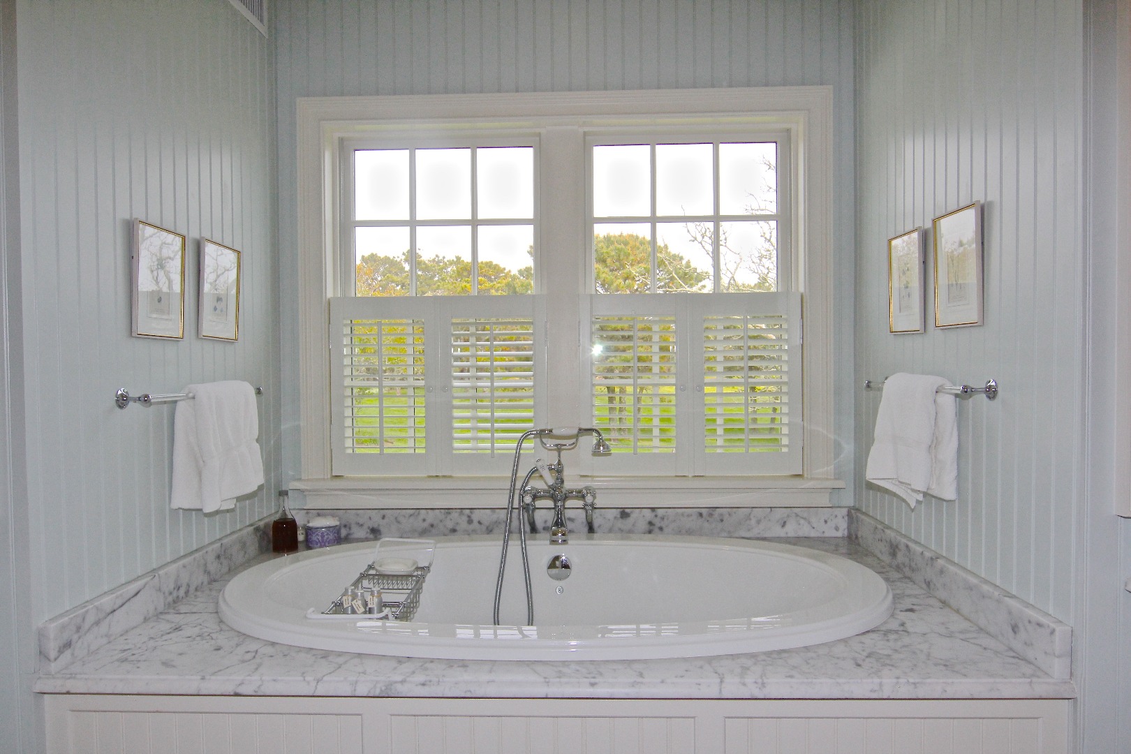22 Lelands Path Edgartown, MA 02539 - Photo 35 of 87 a bathroom with tub sink and window