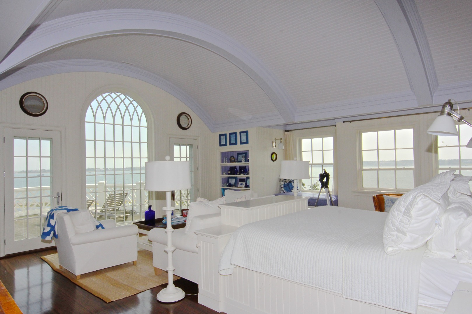 22 Lelands Path Edgartown, MA 02539 - Photo 40 of 87 a bedroom with a bed mirror and window