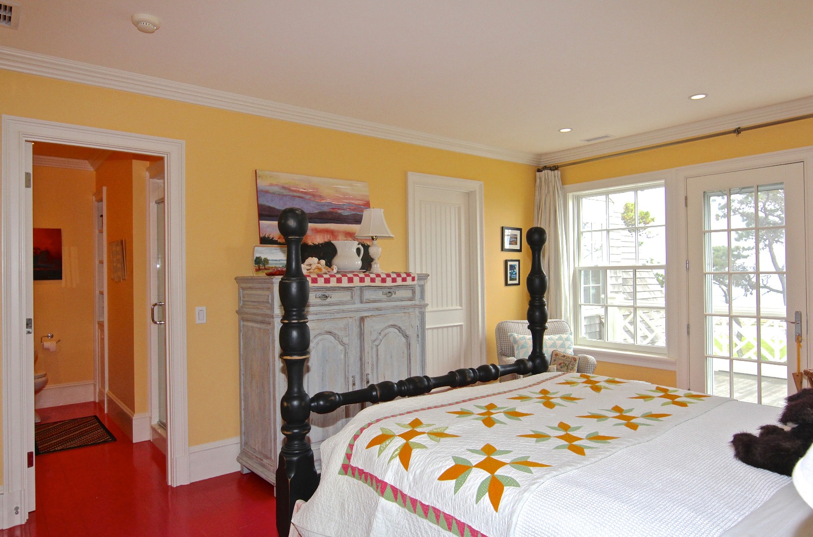 22 Lelands Path Edgartown, MA 02539 - Photo 49 of 87 a bed sitting in a bedroom next to a window