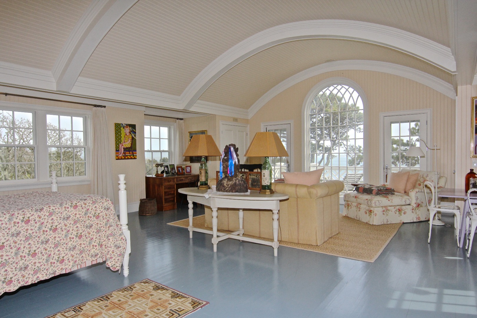 22 Lelands Path Edgartown, MA 02539 - Photo 54 of 87 a living room with furniture a dining table and a large window
