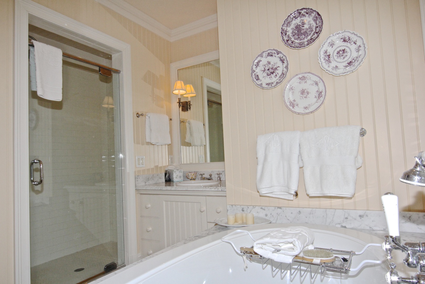 22 Lelands Path Edgartown, MA 02539 - Photo 59 of 87 a bathroom with a granite countertop sink and a mirror
