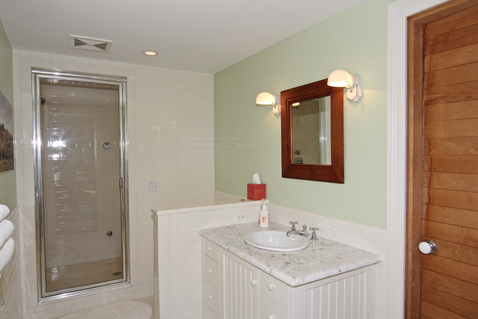 22 Lelands Path Edgartown, MA 02539 - Photo 75 of 87 a bathroom with a granite countertop sink and a mirror