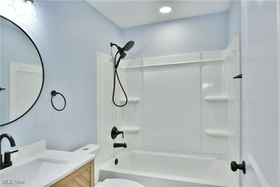 2096 Stillwagon Road Southeast Warren, OH 44484 - Photo 27 of 50 Full bath featuring shower / bath combination, vanity, recessed lighting, and toilet