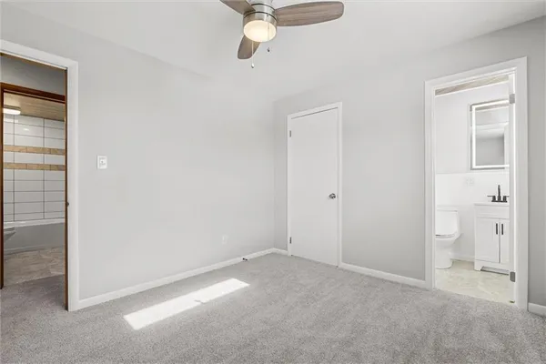 a view of a room with a wardrobe space