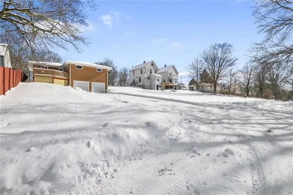 a house with trees in front of it