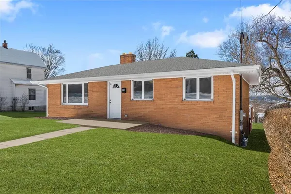 a view of a backyard with a garden