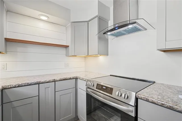 a view of a kitchen with a sink