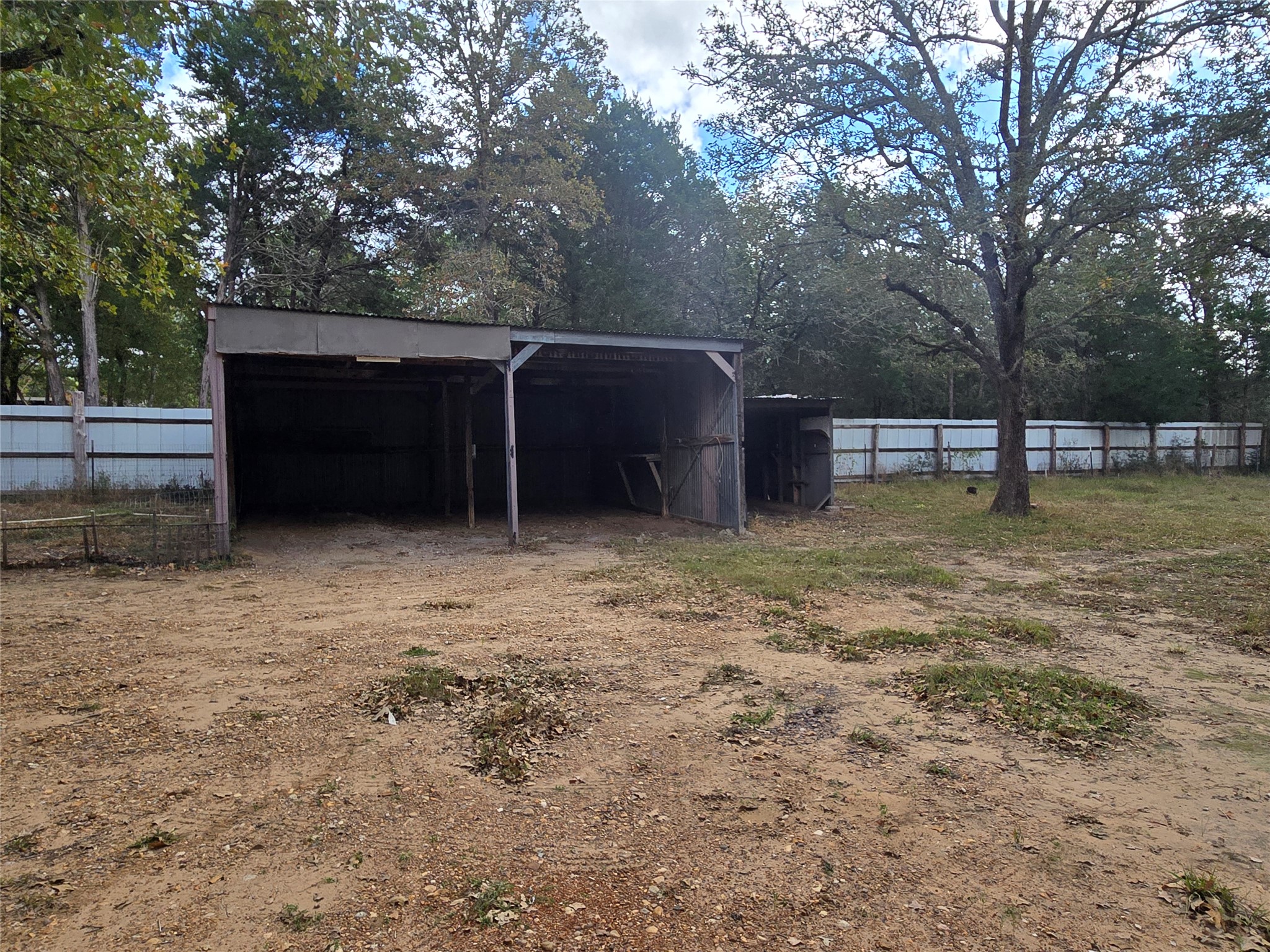 147 Sunset Heights Bastrop, TX 78602 - Photo 10 of 20 a view of a yard with a tree