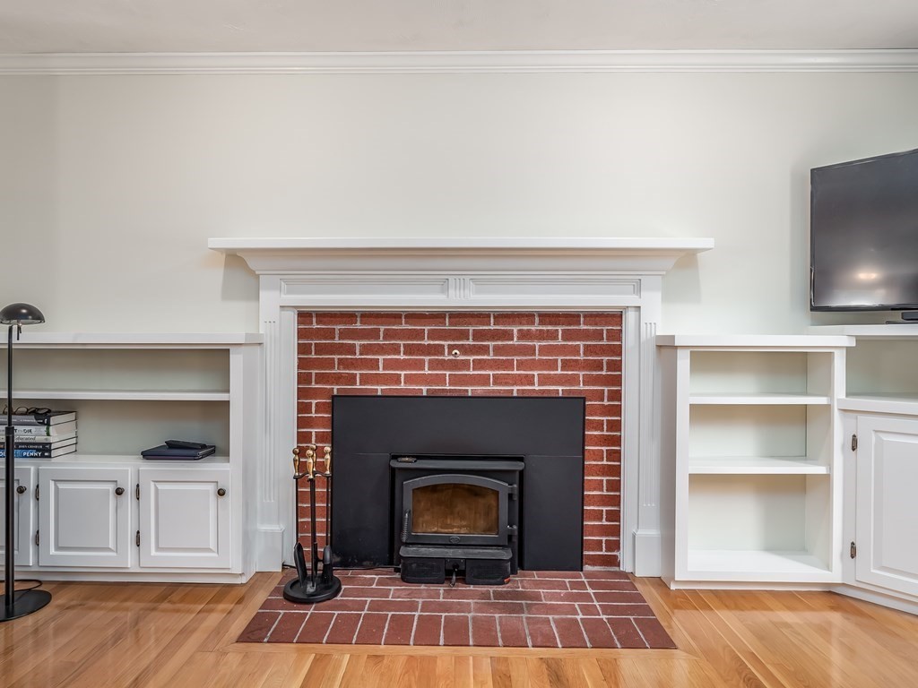 76 Williams Way Rochester, MA 02770 - Photo 15 of 42 a living room with a fireplace