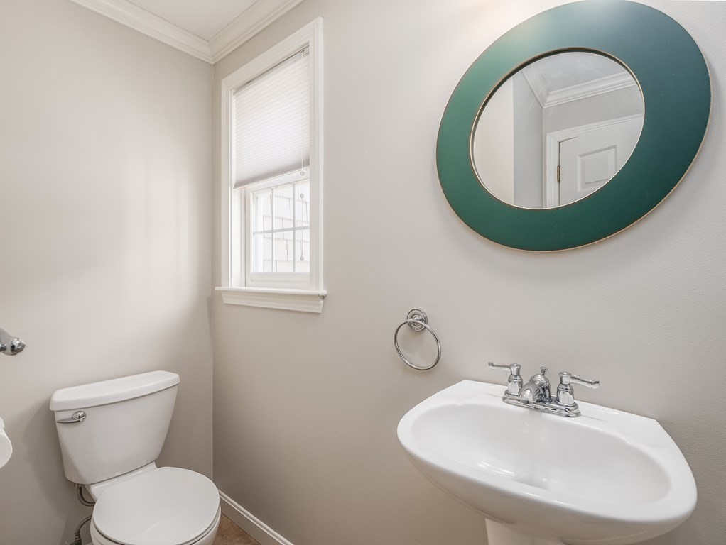 76 Williams Way Rochester, MA 02770 - Photo 18 of 42 a bathroom with a toilet sink and mirror