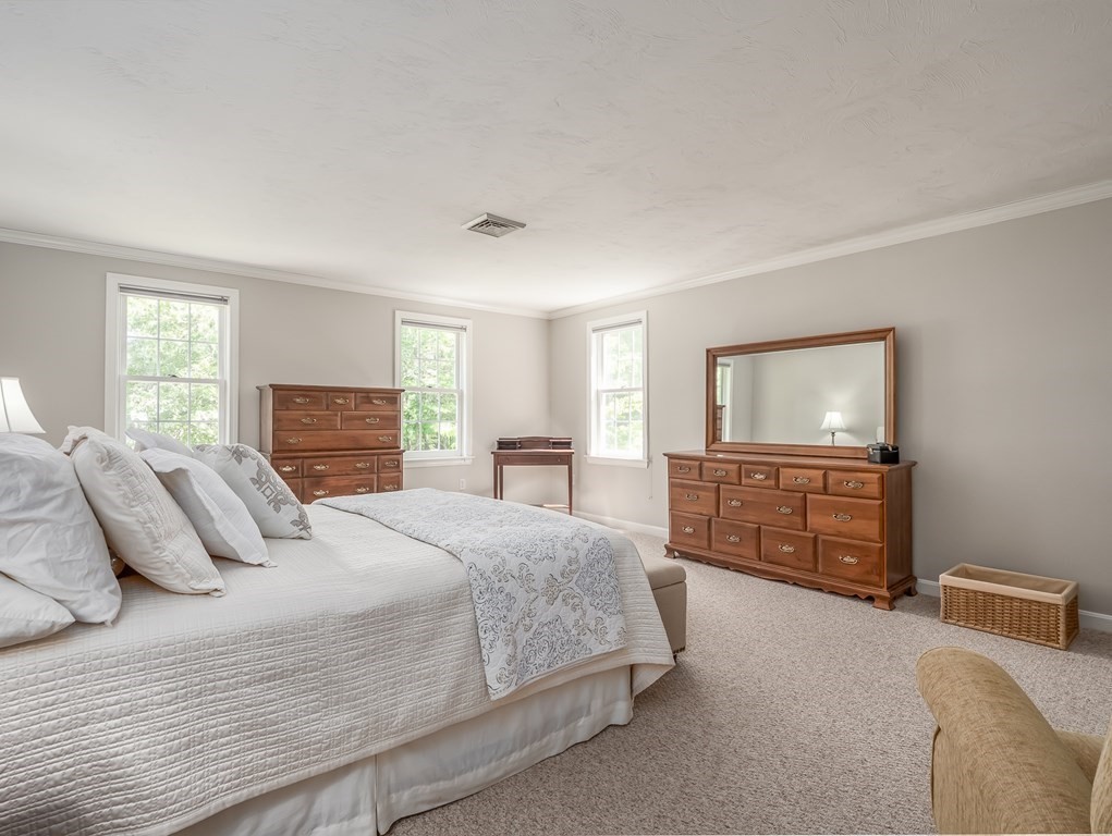 76 Williams Way Rochester, MA 02770 - Photo 19 of 42 a bedroom with a bed and dresser