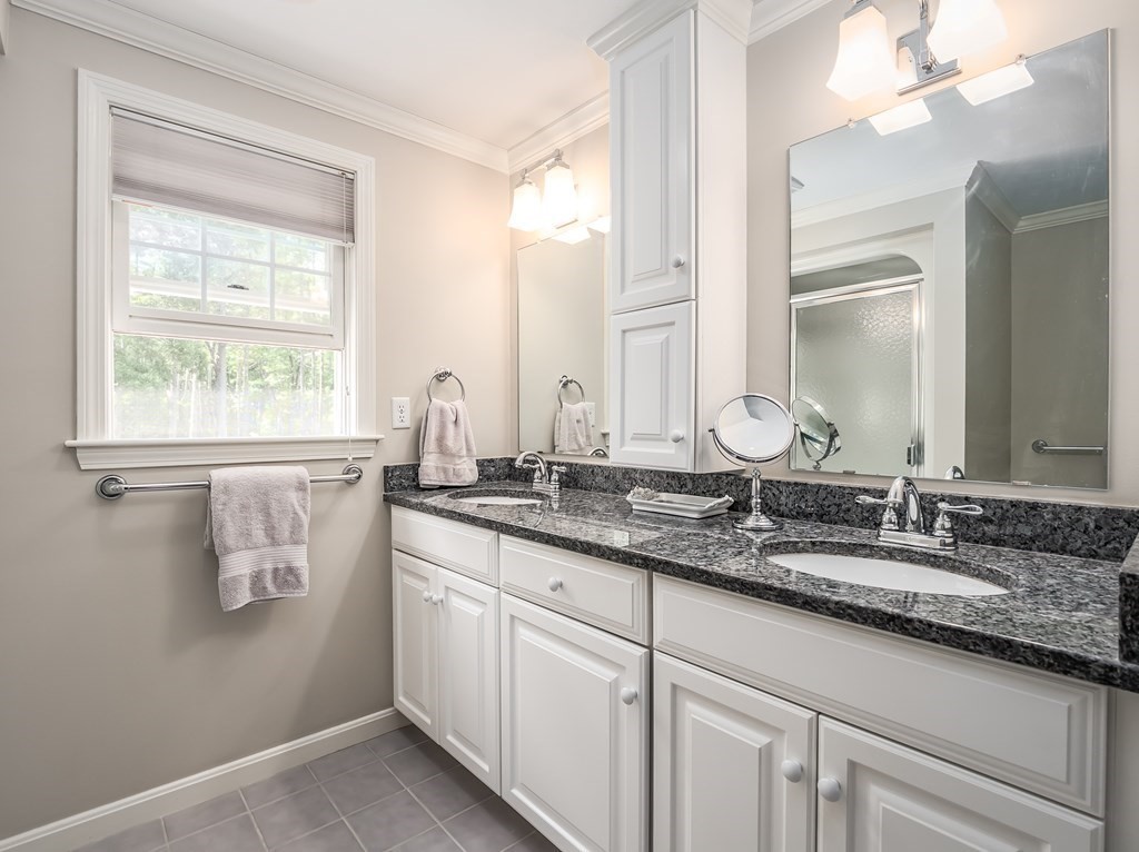 76 Williams Way Rochester, MA 02770 - Photo 21 of 42 a bathroom with a sink a vanity and a mirror