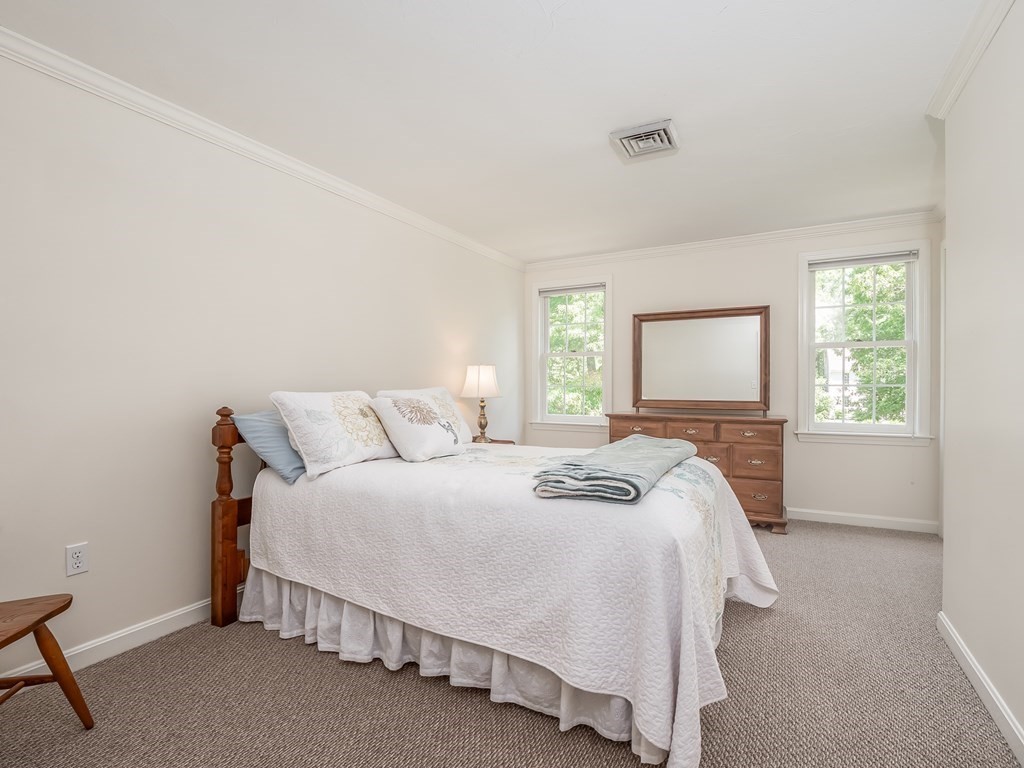 76 Williams Way Rochester, MA 02770 - Photo 23 of 42 a bedroom with a bed and window