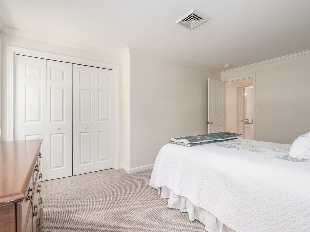 76 Williams Way Rochester, MA 02770 - Photo 24 of 42 a bedroom with a bed and a window