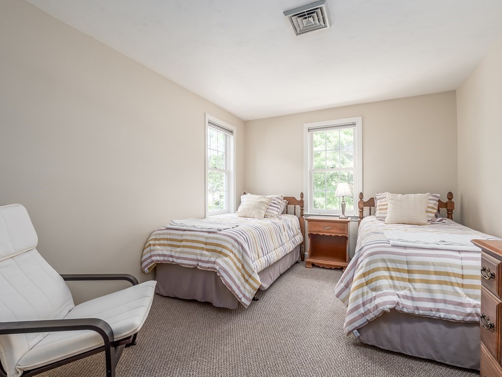 76 Williams Way Rochester, MA 02770 - Photo 26 of 42 a bedroom with two beds and a couch