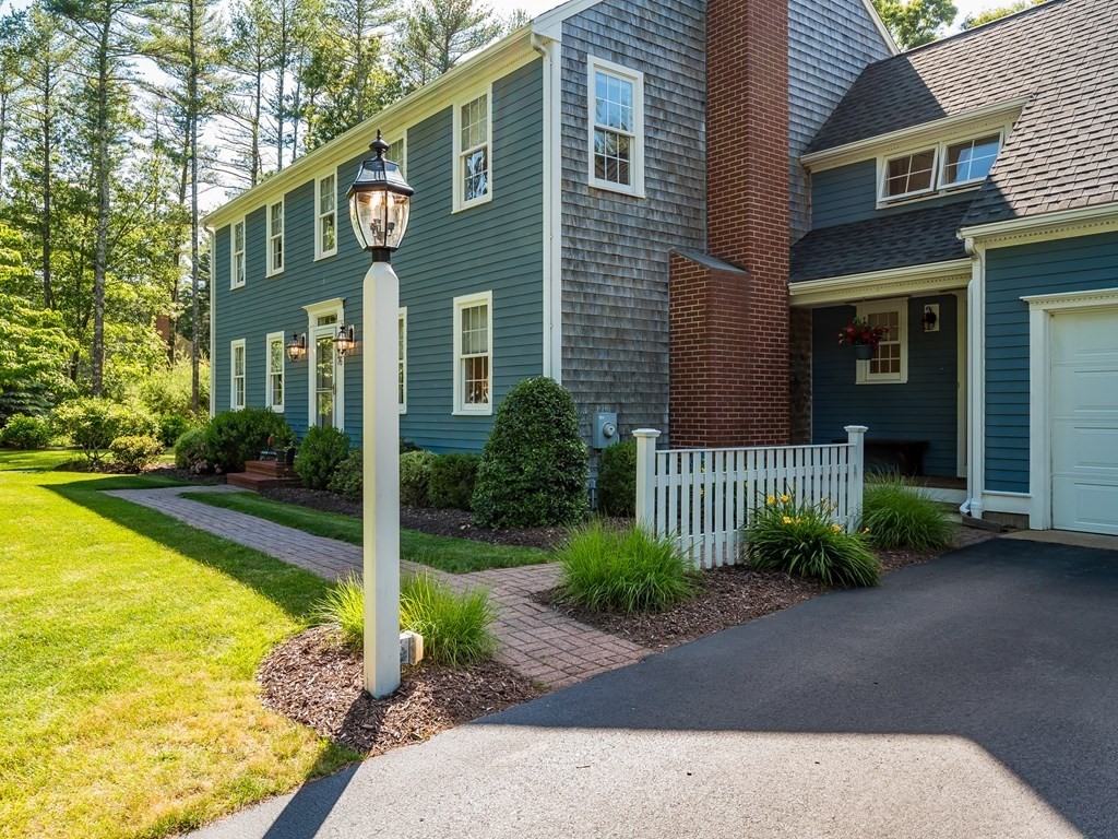 76 Williams Way Rochester, MA 02770 - Photo 29 of 42 a front view of a house having yard