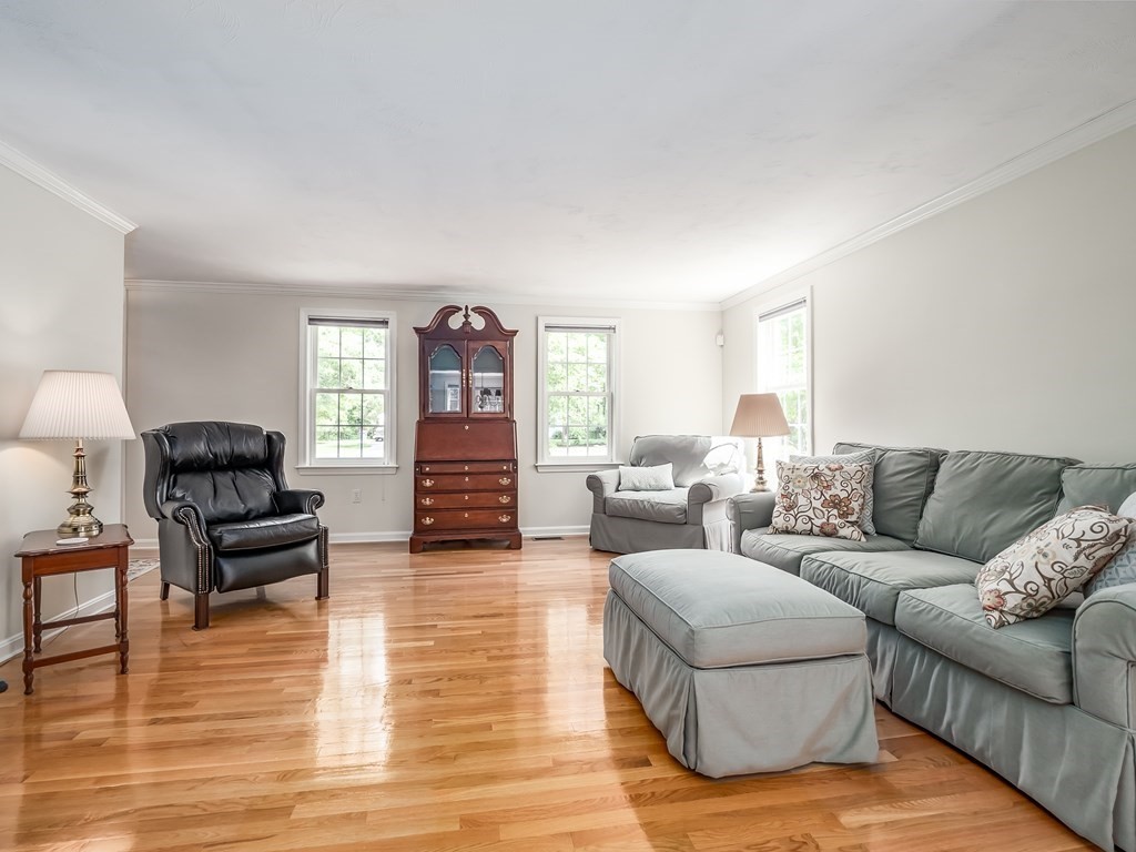 76 Williams Way Rochester, MA 02770 - Photo 4 of 42 a living room with furniture and a wooden floor