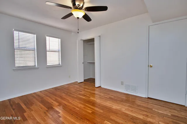 a kitchen with stainless steel appliances a refrigerator and a stove