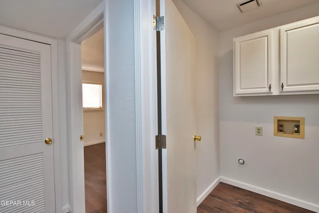 a view of a backyard of the house