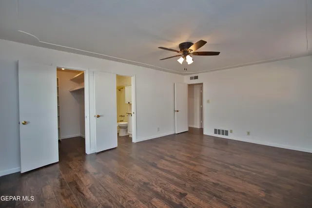 a view of water with palm trees