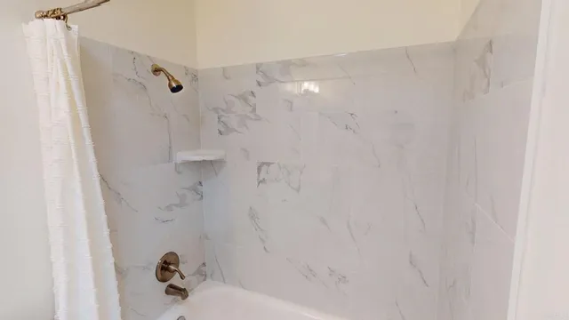 a view of empty room with windows