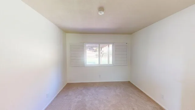 a view of a golf course with a yard