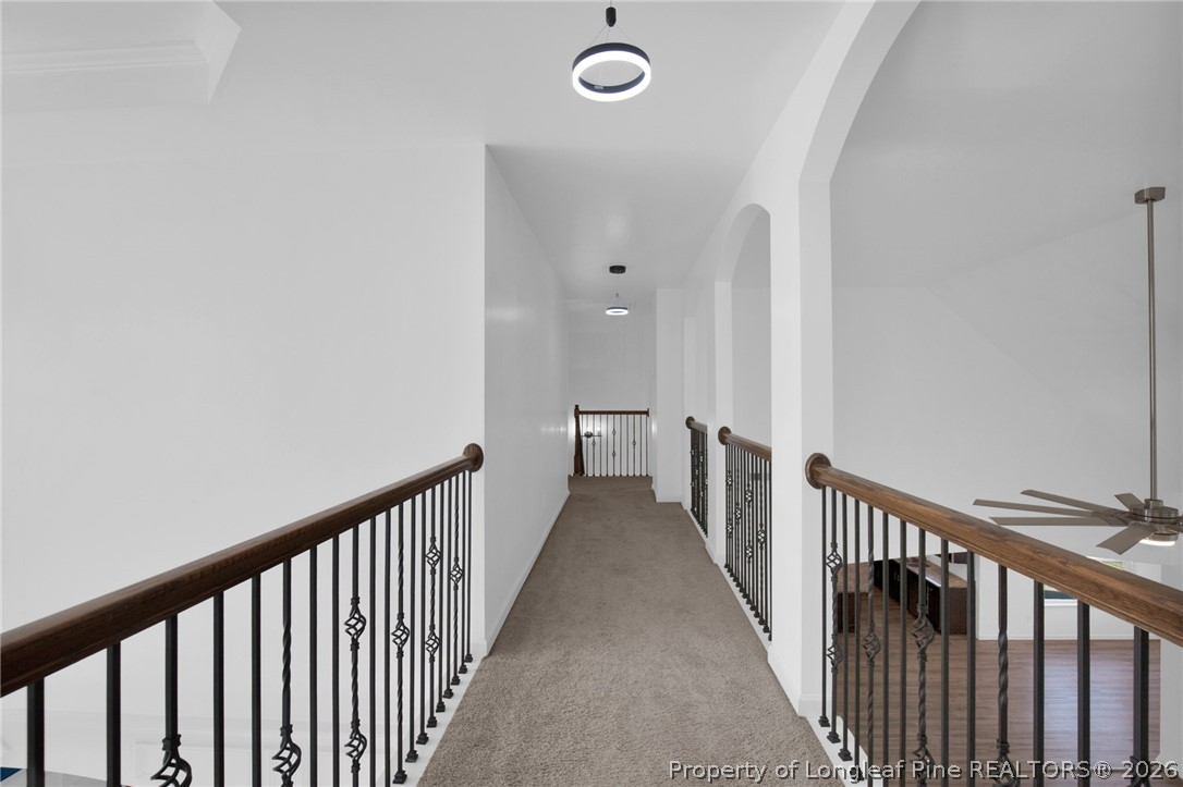 2145 Harrington Road Fayetteville, NC 28306 - Photo 34 of 50 a view of a hallway with wooden floor