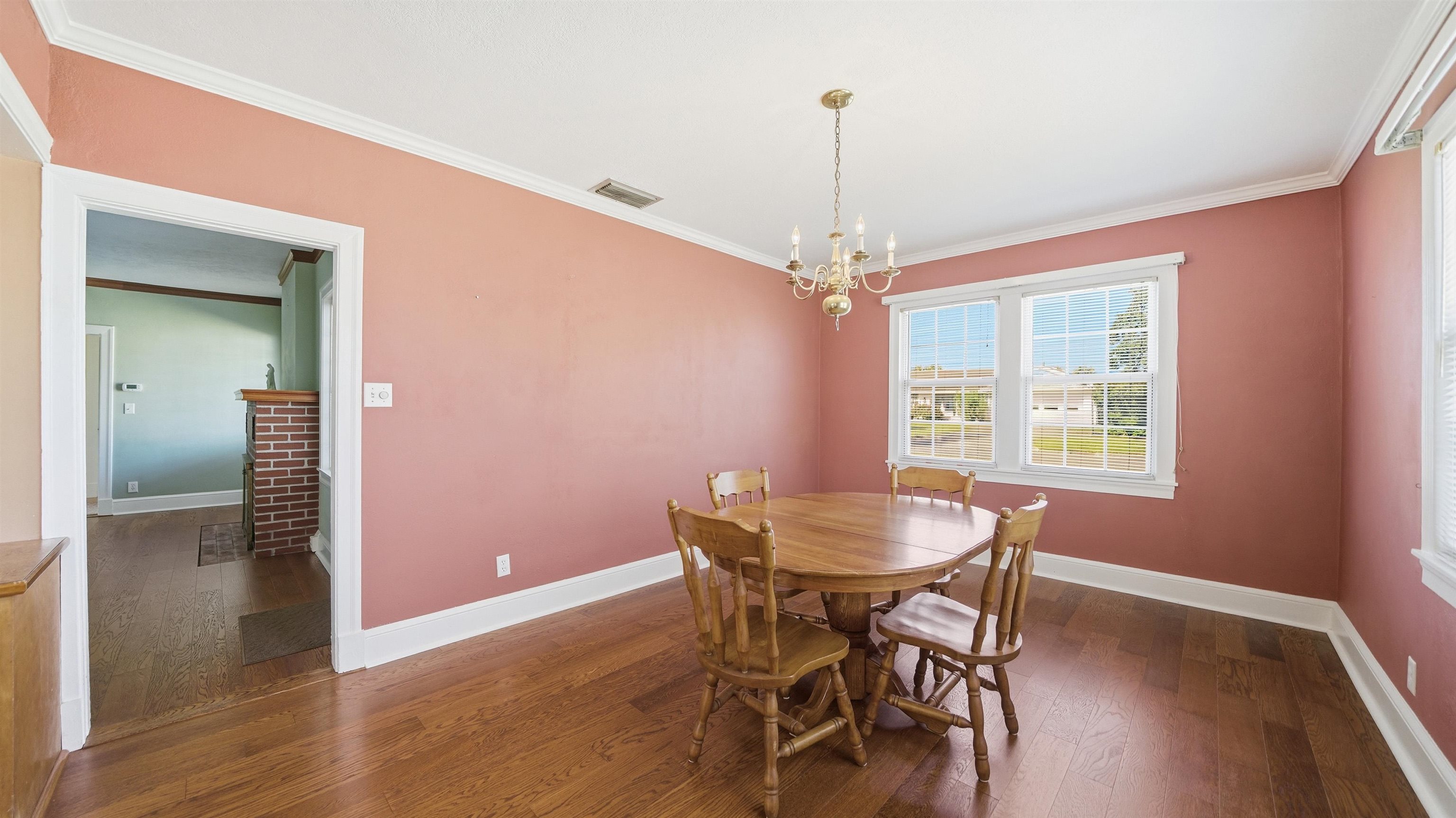 196 Inlet Drive St. Augustine, FL 32080 - Photo 11 of 52 a view of a dining room with furniture window and wooden floor