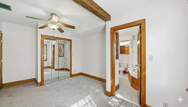 a view of empty room with windows