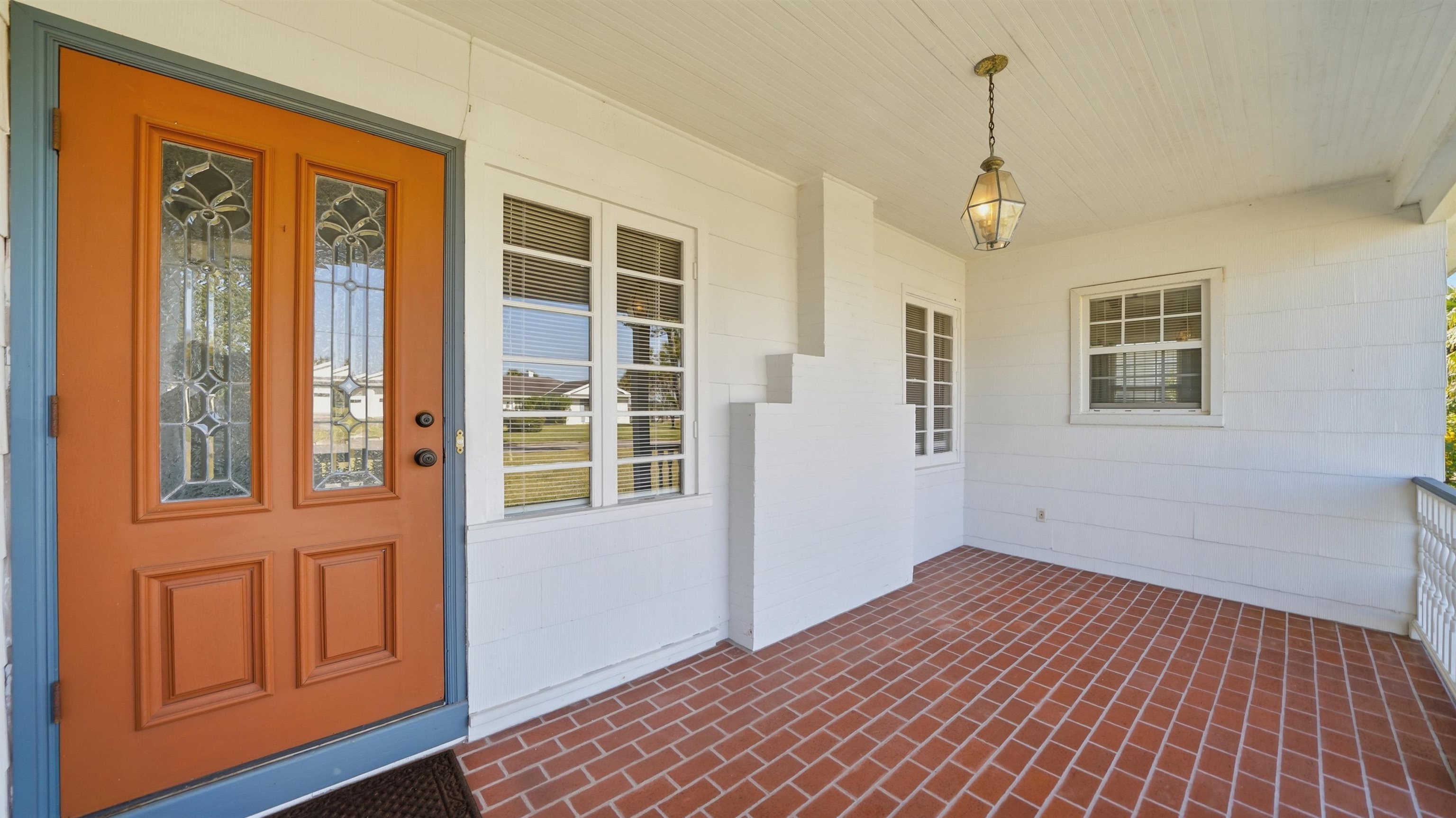 196 Inlet Drive St. Augustine, FL 32080 - Photo 4 of 52 a view of an empty room with wooden floor and windows