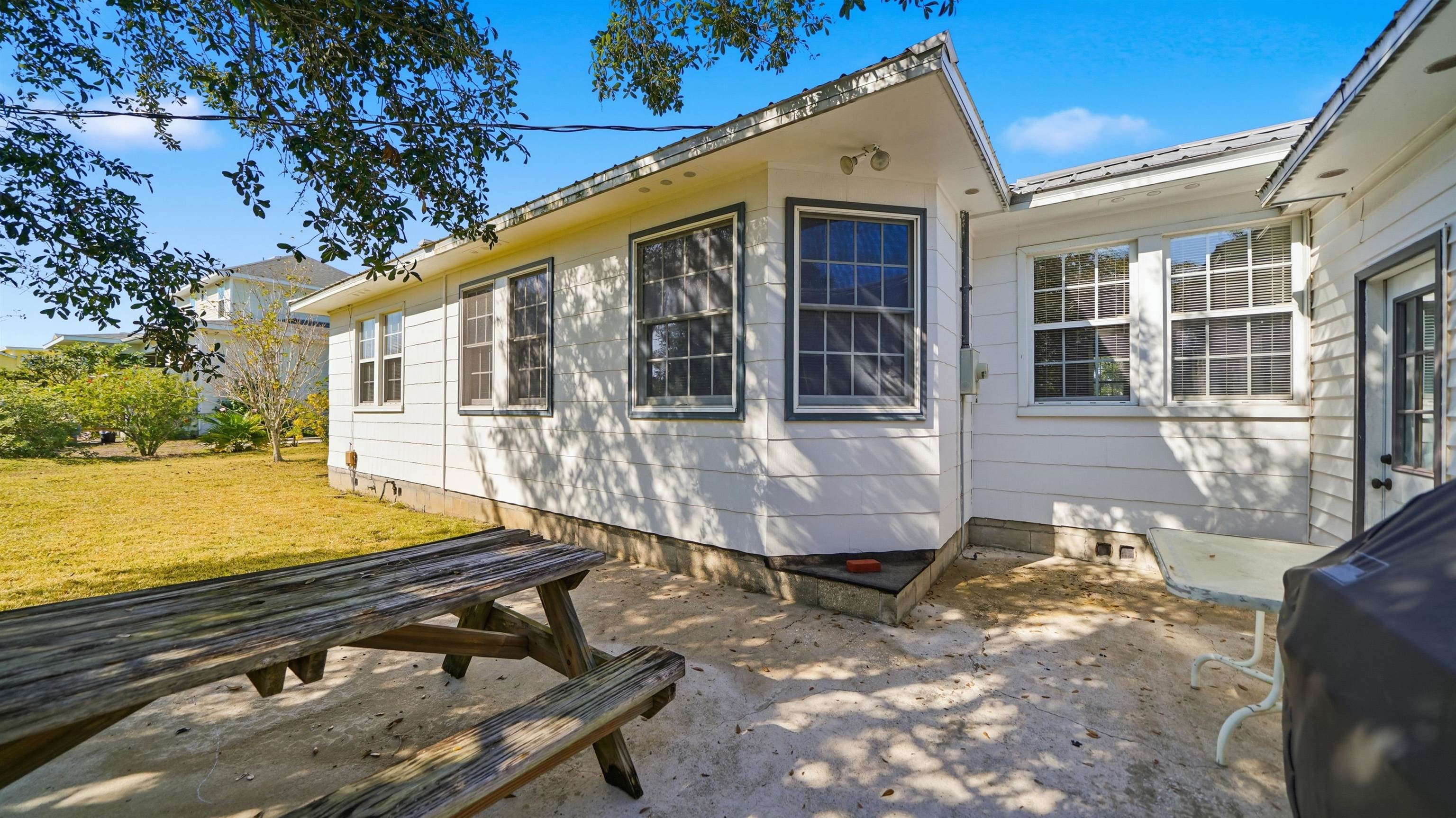 196 Inlet Drive St. Augustine, FL 32080 - Photo 42 of 52 a view of a house with backyard and sitting area
