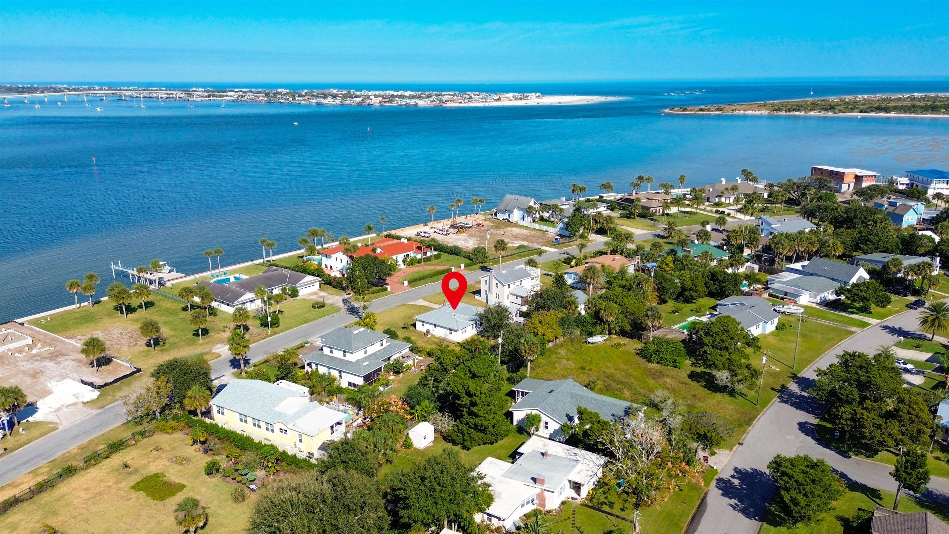 196 Inlet Drive St. Augustine, FL 32080 - Photo 47 of 52 Aerial overview of property's location with nearby suburban area, a large body of water, and a notable bridge
