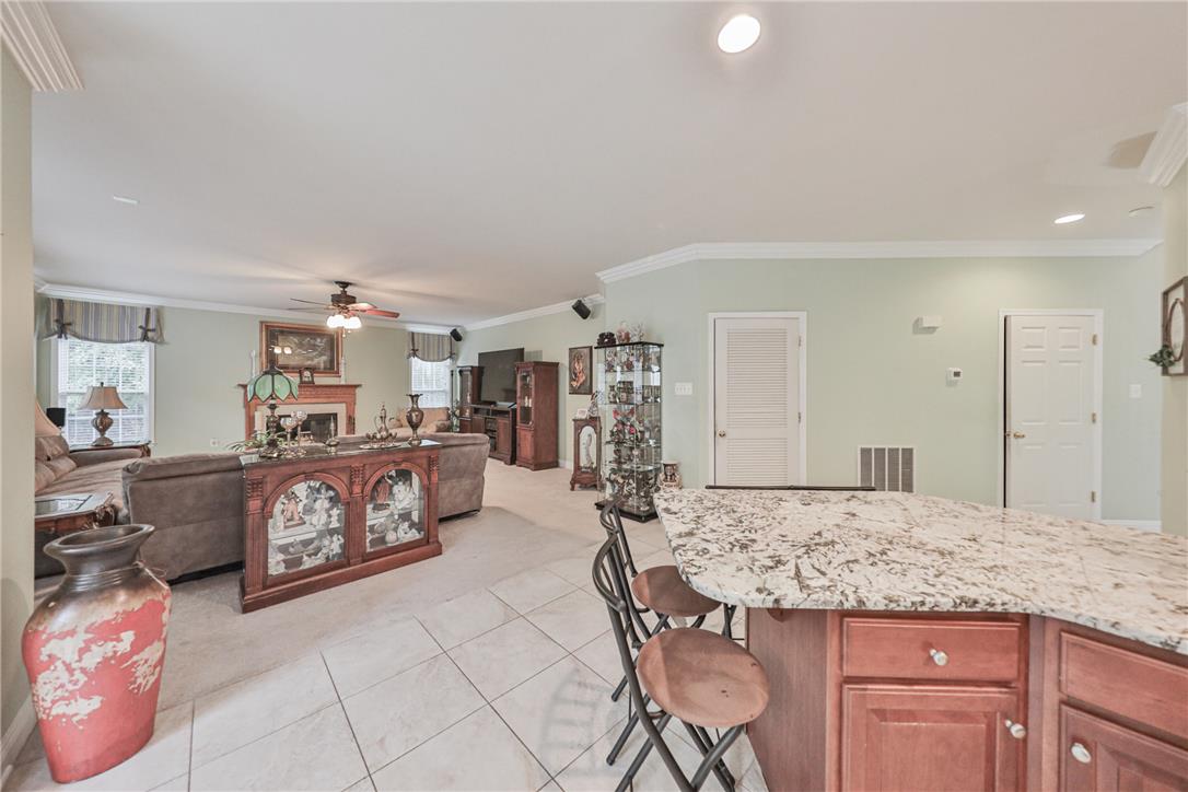 138 Clover Hollow Road Easton, PA 18045 - Photo 28 of 95 A welcoming living space flows into a functional kitchen area, perfect for entertaining.
