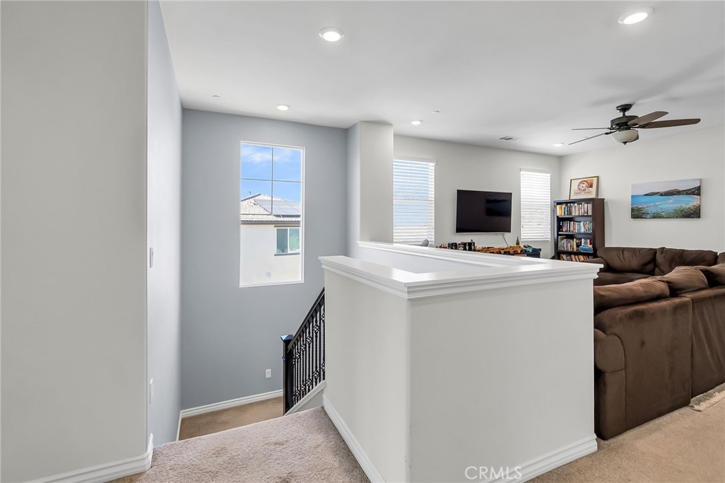 16568 Fleur Boulevard Riverside, CA 92503 - Photo 20 of 48 a view of living room with washer and flat screen tv