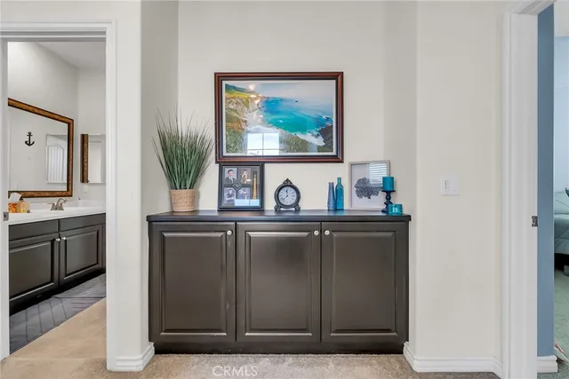 a view of a sink and a microwave