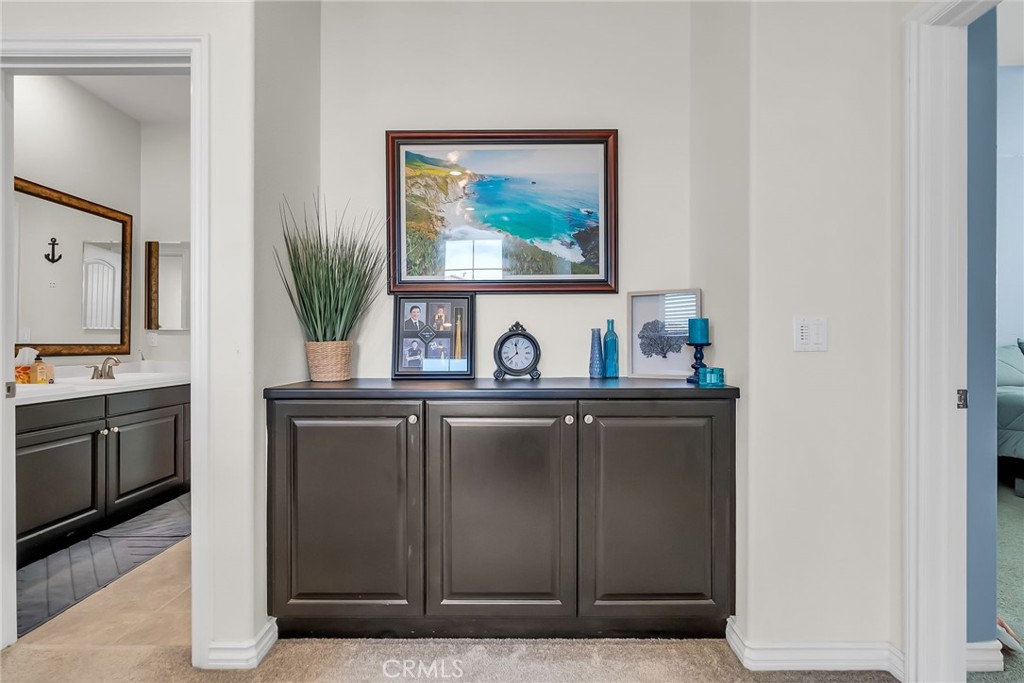16568 Fleur Boulevard Riverside, CA 92503 - Photo 21 of 48 a view of a sink and a microwave