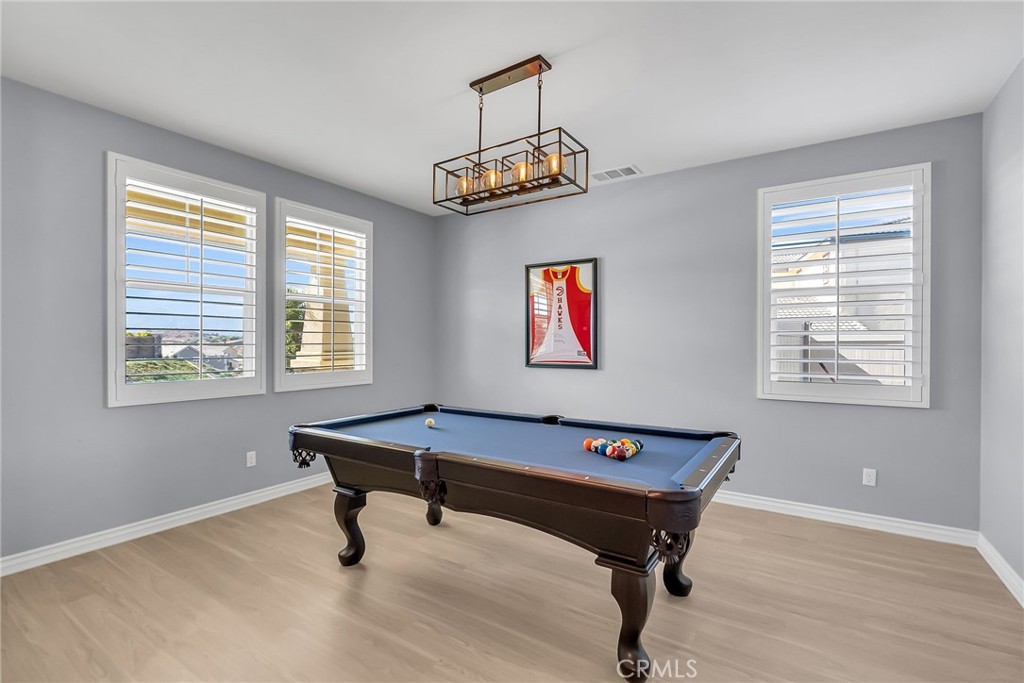 16568 Fleur Boulevard Riverside, CA 92503 - Photo 3 of 48 a room with chair and window