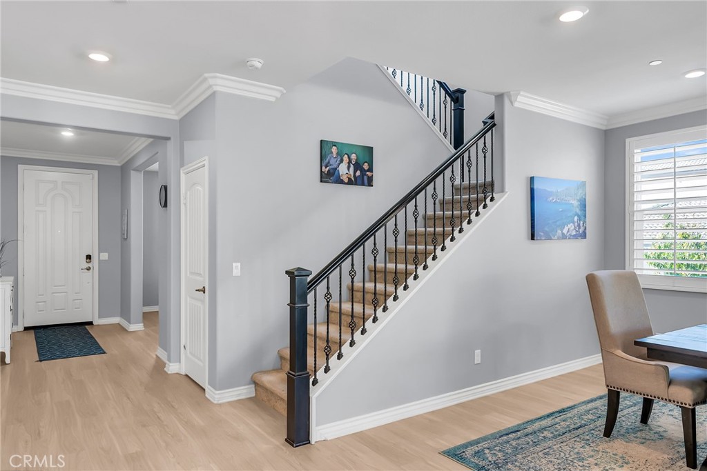 16568 Fleur Boulevard Riverside, CA 92503 - Photo 4 of 48 a view of entryway and hall with wooden floor