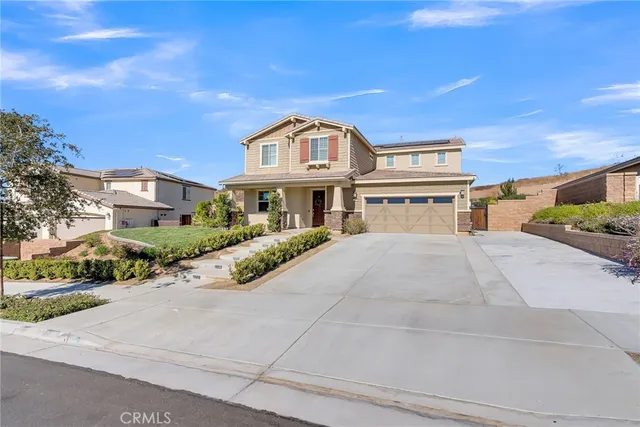 front view of a house with a street