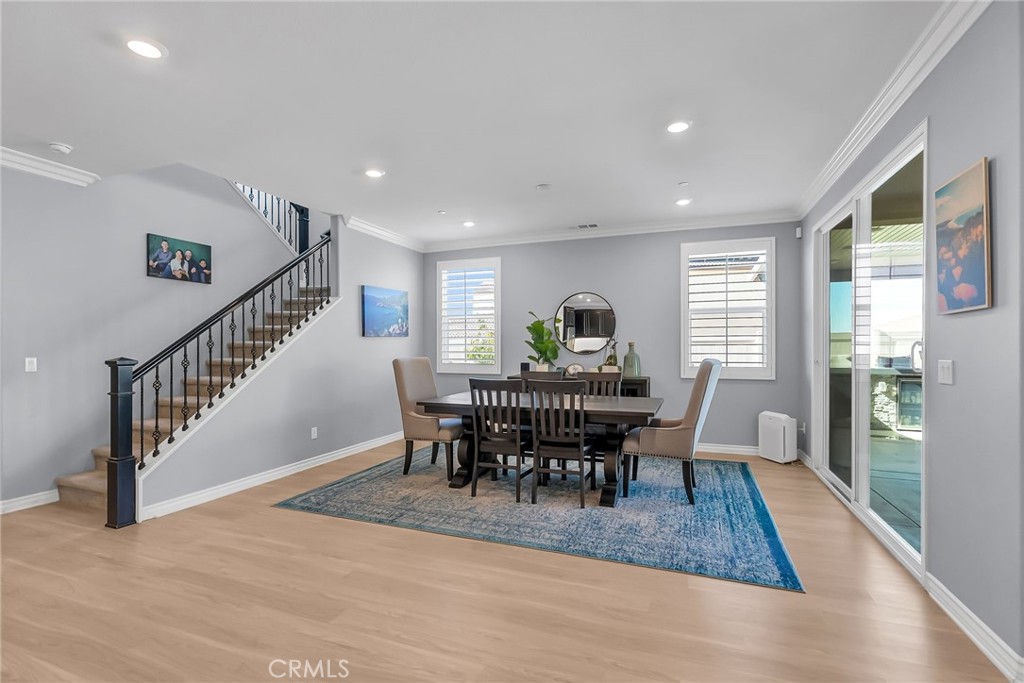 16568 Fleur Boulevard Riverside, CA 92503 - Photo 5 of 48 a view of a dining room with furniture window and wooden floor