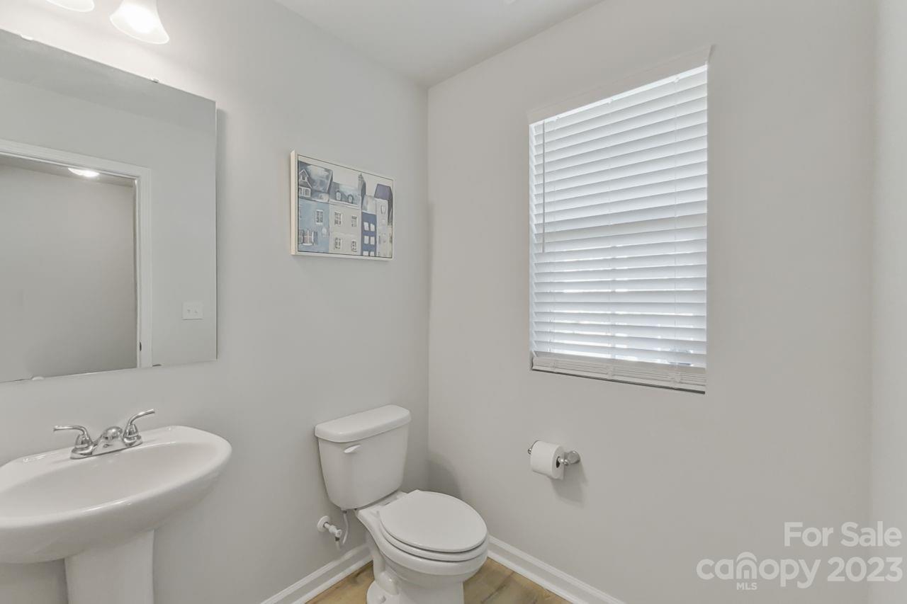 200 Windfall Road Blythewood, SC 29016 - Photo 11 of 20 a bathroom with a toilet a sink and a window