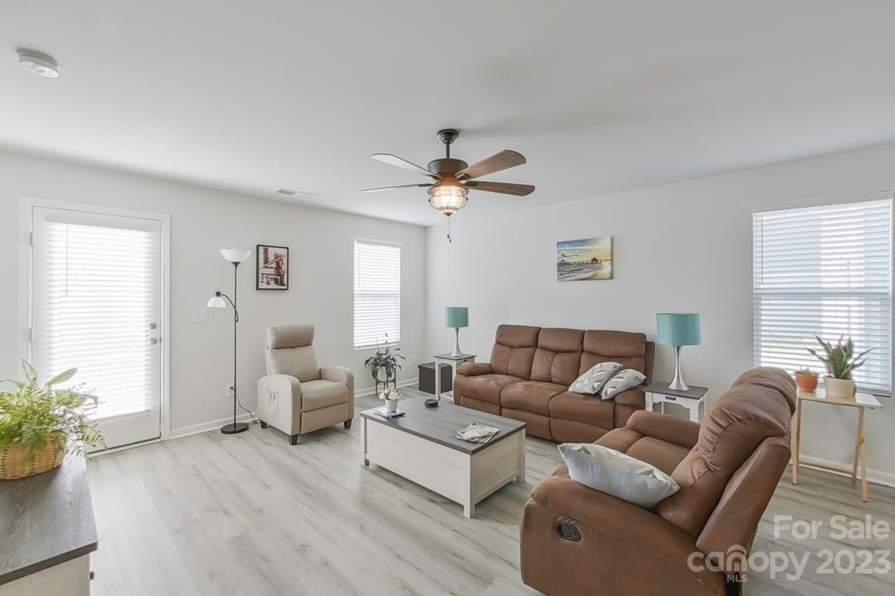 200 Windfall Road Blythewood, SC 29016 - Photo 8 of 20 a living room with furniture and a large window