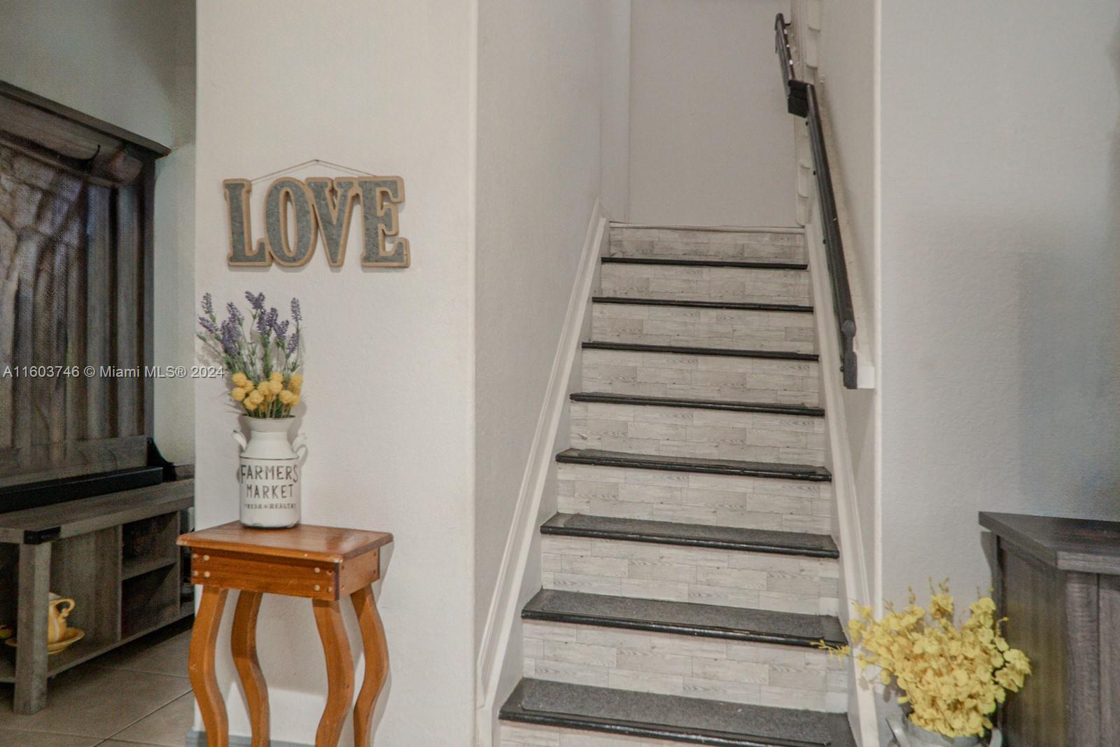 1401 Southeast 20th Road Homestead, FL 33035 - Photo 13 of 24 a view of entryway with stairs and wooden floor