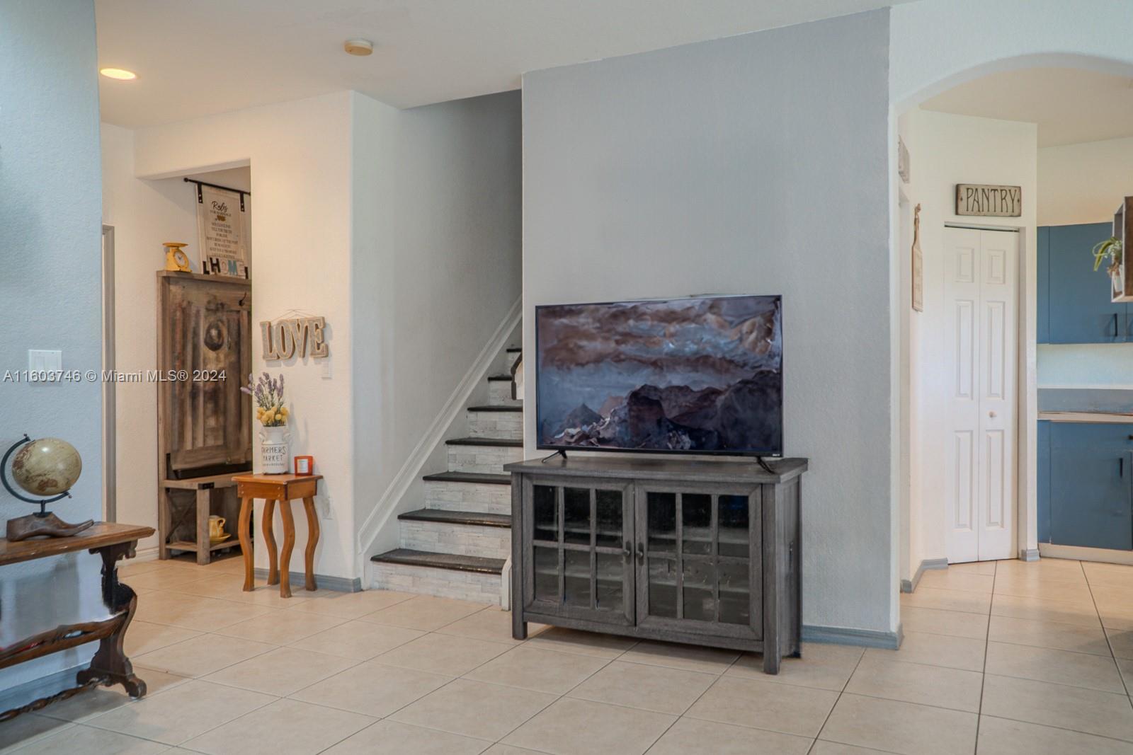 1401 Southeast 20th Road Homestead, FL 33035 - Photo 6 of 24 a view of a hallway with workspace and entryway