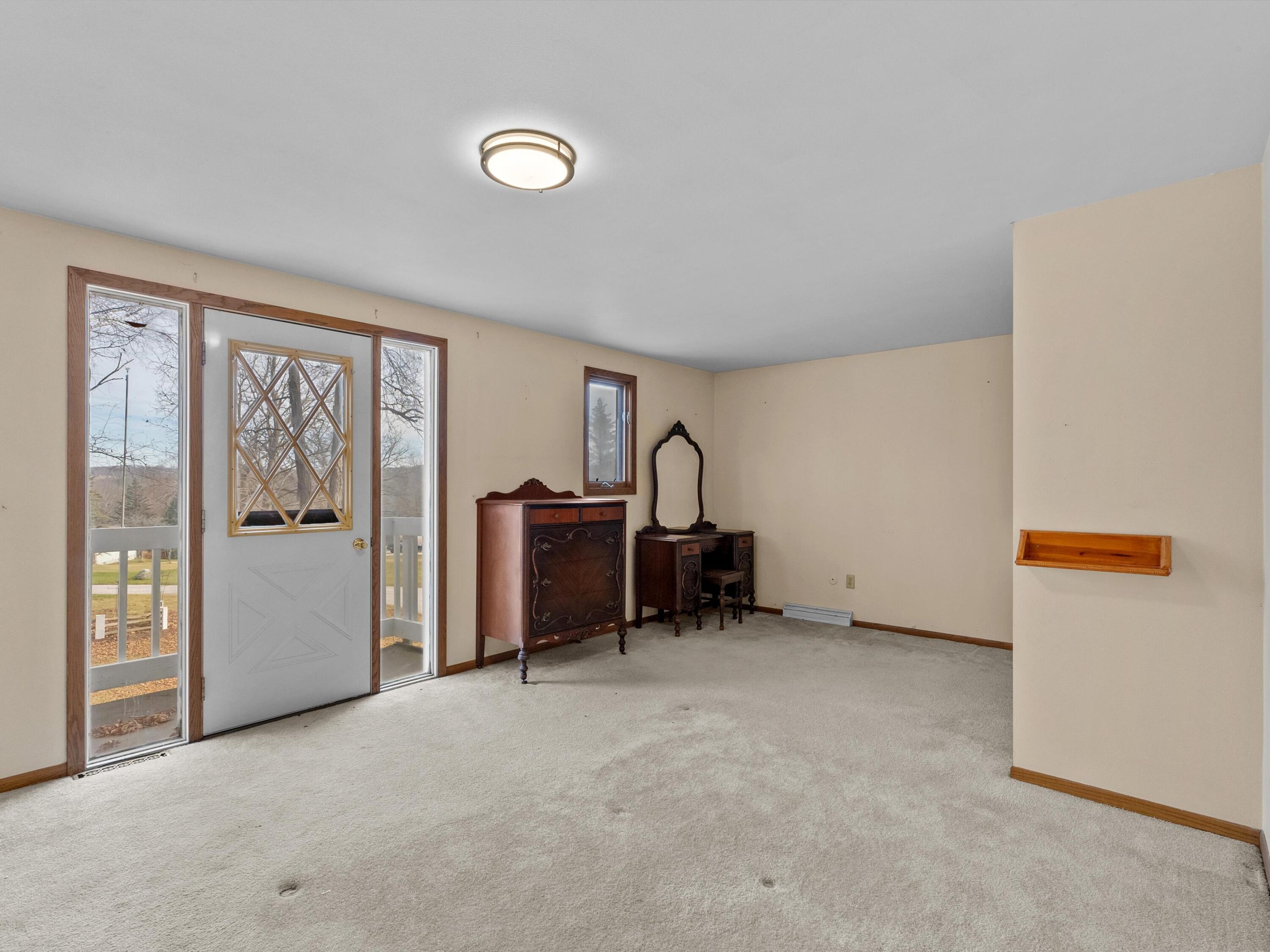 W6331 Westwind Road Plymouth, WI 53073 - Photo 12 of 35 UL Bedroom with Porch